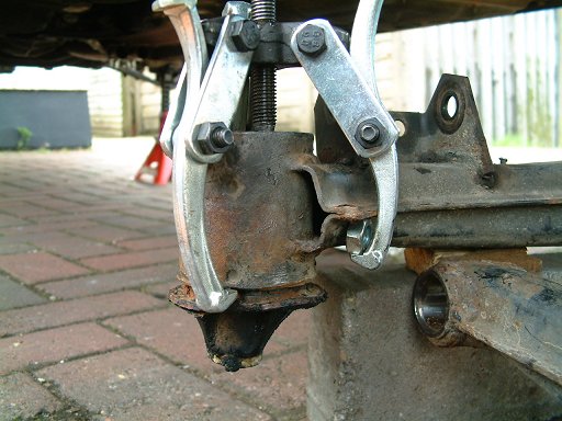 My trusty three-leg puller made relatively light work of the subframe bushes. Note the M10 nut equalising the length of the puller legs.